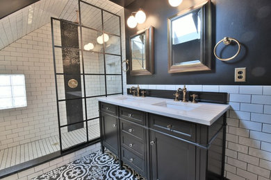 Inspiration for a small timeless master white tile and subway tile porcelain tile and black floor doorless shower remodel in Denver with shaker cabinets, black cabinets, a one-piece toilet, black walls, an undermount sink, granite countertops and white countertops