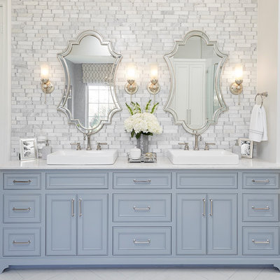 Inspiration for a timeless master white tile and gray tile white floor bathroom remodel in Dallas with beaded inset cabinets, blue cabinets, white walls and a vessel sink