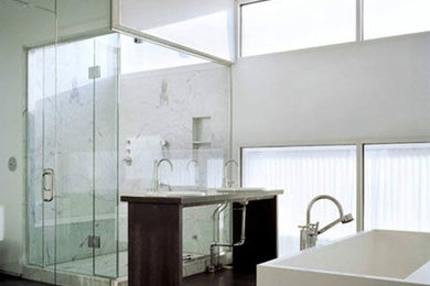 Example of a minimalist white tile and marble tile black floor bathroom design in Chicago with open cabinets, black cabinets, white walls, a drop-in sink, a hinged shower door and gray countertops