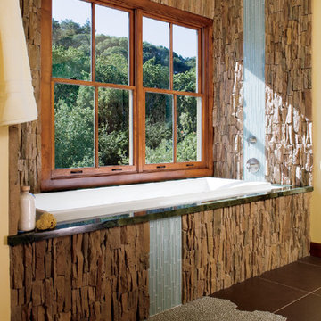 Pella® Architect Series® double-hung windows bathe a room in natural light