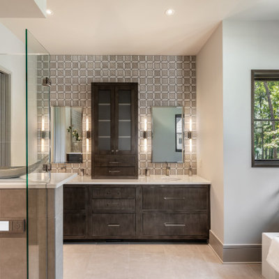 Bathroom - rustic master gray tile gray floor and double-sink bathroom idea in Other with flat-panel cabinets, dark wood cabinets, white walls, an undermount sink, a hinged shower door, white countertops and a built-in vanity