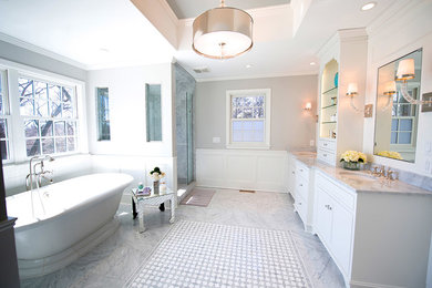 Inspiration for a large transitional master gray tile and stone tile marble floor bathroom remodel in Philadelphia with an undermount sink, beaded inset cabinets, white cabinets, marble countertops, a two-piece toilet and gray walls