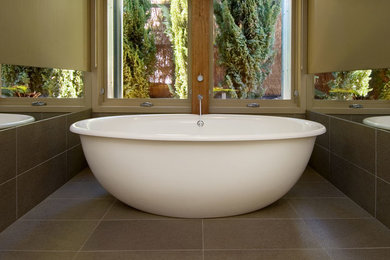 Design ideas for a contemporary bathroom in Melbourne with a freestanding bath.