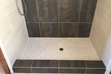 Inspiration for a mid-sized contemporary master multicolored tile and porcelain tile porcelain tile doorless shower remodel in Orange County with a drop-in sink, recessed-panel cabinets, brown cabinets, tile countertops, a one-piece toilet and multicolored walls