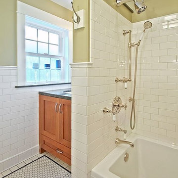 Period appropriate fixtures and white subway tiles