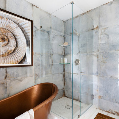 Mid-sized transitional master blue tile and porcelain tile marble floor and white floor bathroom photo in New York with blue walls and a hinged shower door