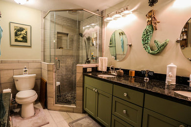 Example of a trendy corner shower design in Atlanta with granite countertops and beige walls