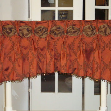 Pinch pleated valance with sash and buttons