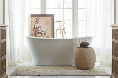 Inspiration for a medium sized traditional ensuite bathroom in Birmingham with a freestanding bath, white walls, marble flooring, marble worktops, white floors, white worktops, flat-panel cabinets and medium wood cabinets.