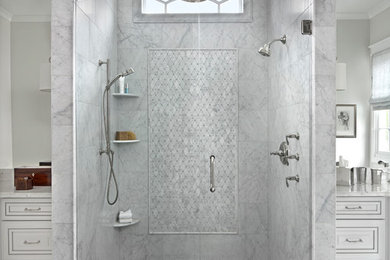 Wet room - large transitional master marble floor wet room idea in Detroit with a hinged shower door, raised-panel cabinets, white cabinets and an undermount sink