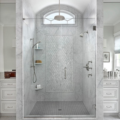 Wet room - large transitional master marble floor wet room idea in Detroit with a hinged shower door, raised-panel cabinets, white cabinets and an undermount sink