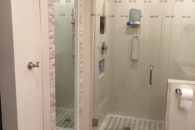 Example of a large cottage chic master beige tile and porcelain tile porcelain tile alcove shower design in San Francisco with shaker cabinets, dark wood cabinets, a two-piece toilet, beige walls, an undermount sink and quartzite countertops