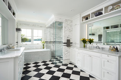 Large transitional master black and white tile and porcelain tile porcelain tile walk-in shower photo in Minneapolis with recessed-panel cabinets, white cabinets, an undermount tub, a two-piece toilet, gray walls, an undermount sink, marble countertops and a hinged shower door