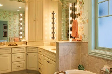 Inspiration for a traditional bathroom in Other with recessed-panel cabinets and beige cabinets.