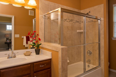 Example of a classic drop-in bathtub design in Other with an integrated sink