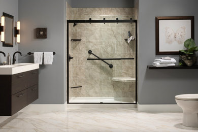 Bathroom - large contemporary 3/4 beige tile and stone tile porcelain tile and beige floor bathroom idea in Chicago with flat-panel cabinets, black cabinets, a two-piece toilet, gray walls, an integrated sink and white countertops