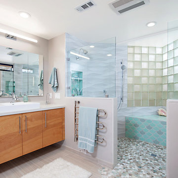 Pony walls with Glass Panels Allow The Shower to Shine