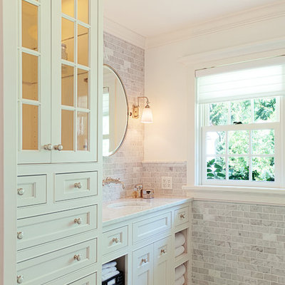 Bathroom - traditional white tile and stone tile bathroom idea in Minneapolis