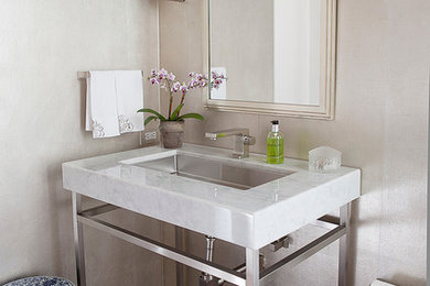 Inspiration for a contemporary dark wood floor bathroom remodel in Bridgeport with a console sink and beige walls