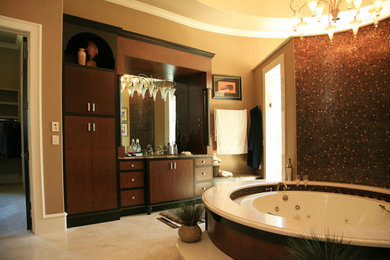 Example of a large tuscan master mosaic tile porcelain tile bathroom design in Other with flat-panel cabinets, dark wood cabinets, beige walls and granite countertops