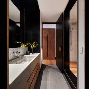 Mid-sized contemporary kids bathroom in Melbourne with medium wood cabinets, a drop-in tub, a one-piece toilet, white tile, mosaic tile, white walls, an undermount sink, concrete benchtops, grey floor, grey benchtops, a single vanity, a built-in vanity and decorative wall panelling.