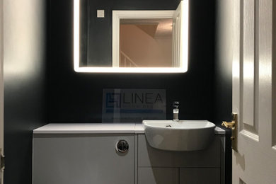 Inspiration for a contemporary cloakroom in Surrey.