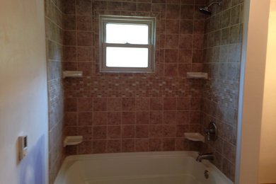 Bathroom - mid-sized transitional master beige tile and porcelain tile porcelain tile bathroom idea in Other