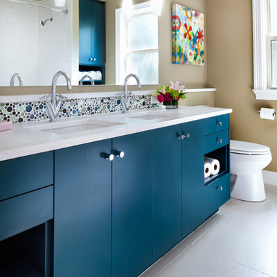 Bathroom - contemporary kids' mosaic tile and multicolored tile bathroom idea in Austin with blue cabinets, an undermount sink, flat-panel cabinets, quartz countertops and beige walls