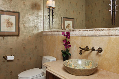 マイアミにあるトラディショナルスタイルのおしゃれな浴室 (ベッセル式洗面器、レイズドパネル扉のキャビネット、濃色木目調キャビネット、御影石の洗面台、石タイル、大理石の床) の写真
