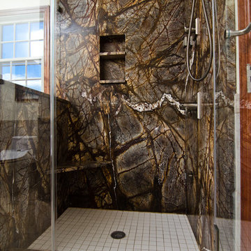 Rainforest Brown Granite vanity, tub surround, and shower wall