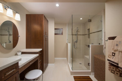 Mid-sized minimalist master white tile and ceramic tile ceramic tile corner shower photo in San Diego with a drop-in sink, recessed-panel cabinets, medium tone wood cabinets, a one-piece toilet and beige walls