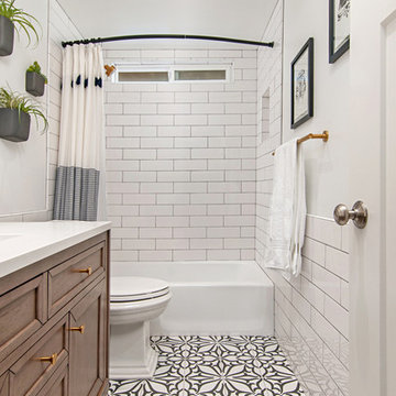Art Deco Tile Flooring and White Subway Tile in Bathroom Remodeling
