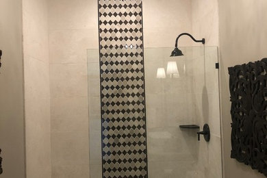 Mid-sized transitional marble tile doorless shower photo in San Diego with furniture-like cabinets, dark wood cabinets, quartzite countertops and white countertops