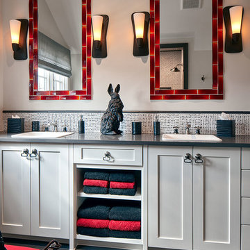 Red, Black and White Ensuite Bathroom with Tile-Framed Mirrors