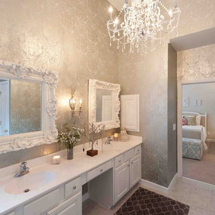 Bathroom - contemporary bathroom idea in DC Metro with an integrated sink, raised-panel cabinets and white cabinets