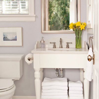 Example of a small classic master marble floor bathroom design in Seattle with an undermount sink, white cabinets, quartz countertops, a two-piece toilet and purple walls