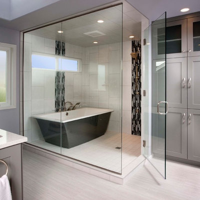 Example of a large transitional master porcelain tile and white tile porcelain tile bathroom design in Seattle with an undermount sink, shaker cabinets, gray cabinets, quartz countertops and gray walls