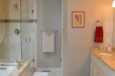 Example of a large transitional master beige tile and porcelain tile porcelain tile alcove shower design in Seattle with an undermount sink, granite countertops, an undermount tub, a two-piece toilet and beige walls