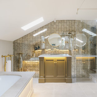 Medium sized modern ensuite bathroom in Other with freestanding cabinets, a submerged bath, a built-in shower, metal tiles, grey walls, beige floors and white worktops.