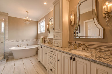 Example of a large minimalist master gray tile, white tile and matchstick tile porcelain tile bathroom design in Other with distressed cabinets, beige walls, an undermount sink, granite countertops and raised-panel cabinets