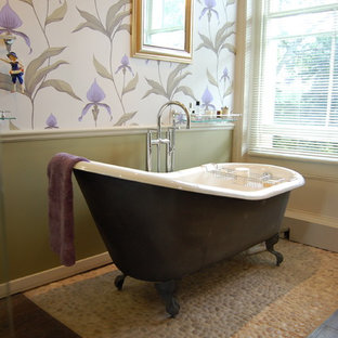 Victorian half tiled bathroom in Surrey with a claw-foot bath, pebble tiles, multi-coloured walls and pebble tile flooring.