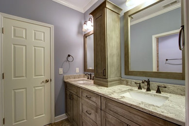 Mid-sized elegant master bathroom photo in Atlanta with shaker cabinets, purple walls, an undermount sink and granite countertops