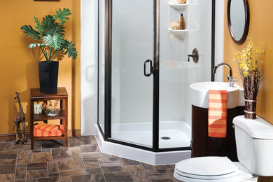 Example of a mid-sized trendy 3/4 porcelain tile and brown floor corner shower design in Philadelphia with furniture-like cabinets, brown cabinets, a two-piece toilet, orange walls, an integrated sink and a hinged shower door