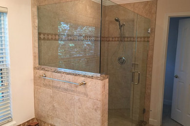 Mid-sized transitional master beige tile and cement tile ceramic tile doorless shower photo in Jacksonville with pink walls and quartzite countertops