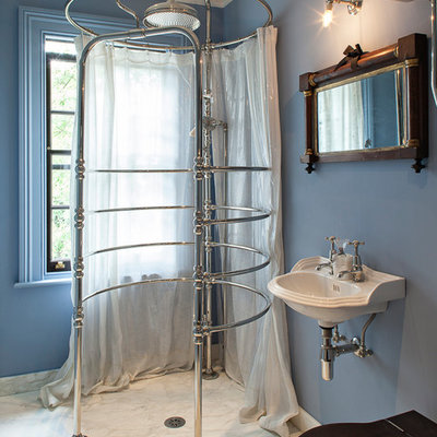 Bathroom - victorian marble floor bathroom idea in London with a wall-mount sink, a one-piece toilet and blue walls
