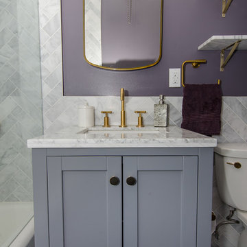 Rich Marble & Gold Bathroom Remodel