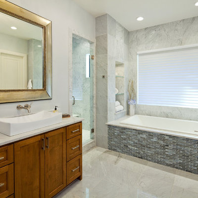 Example of a trendy mosaic tile bathroom design in Austin with a vessel sink