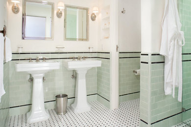Example of a classic green tile and subway tile mosaic tile floor and multicolored floor bathroom design in Santa Barbara with a pedestal sink and green walls
