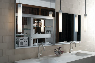 Immagine di una stanza da bagno design di medie dimensioni con piastrelle beige, piastrelle in ceramica e lavabo sottopiano