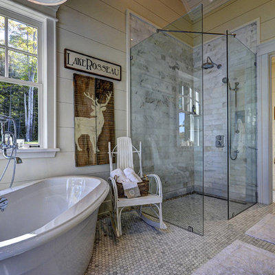 Mountain style master mosaic tile and gray tile bathroom photo in Toronto with beige walls